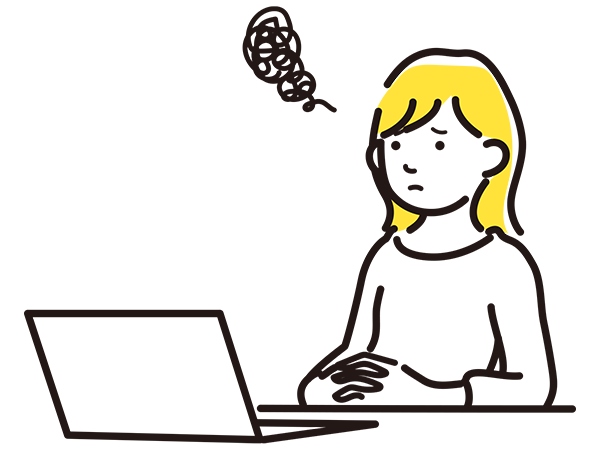 パソコンの前で困っている女性